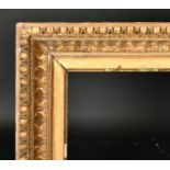 19th Century French School. A Gilt Composition Empire Frame, rebate 44" x 26.5" (111.7 x 67.3cm)