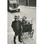 George Rodger (1908-1995) British. "Boy Wearing his Tin Helmet", Photograph, 14" x 9.5" (35.5 x 24.