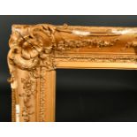 19th Century English School. A Gilt Composition Frame, with swept centres and corners, rebate 36"