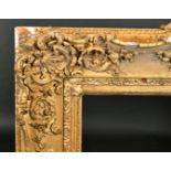 19th Century English School. A Gilt Composition Frame, with swept centres and corners, rebate 35.25"