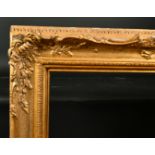 19th Century English School. A Gilt Composition Frame, with swept centres and corners, rebate 31"