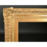 20th Century English School. A Gilt Composition Frame, with swept centres and corners, rebate 41"
