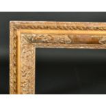 19th Century English School. A Carved Giltwood Frame with Panels, rebate 36" x 28" (91.5 x 71.1cm)