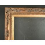 20th Century English School. A Gilt Composition Frame, with swept and pierced centres and corners