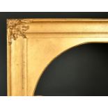 Early 20th Century English School. A Gilt Composition Frame, with an arched board slip, rebate 30" x