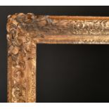 18th Century English School A Carved Giltwood Frame, with swept and pierced centres and corners,