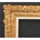 20th Century English School A Gilt Composition Frame, with swept corners and a white painted sli