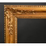 Early 19th Century English School A Gilt Composition Frame, with swept centres and corners, reba