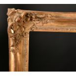 20th Century European School A Gilt Composition Frame, with swept and pierced centres and corner