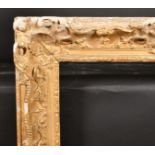 18th Century French School. A Carved Giltwood Louis Frame, with swept and pierced centres and corner