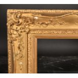 19th Century English School. A Painted Composition Frame, with swept centres and corners, rebate 36"