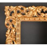 19th Century Italian School. A Carved Giltwood Florentine Frame, rebate 23.75" x 18" (60.3 x 45.7cm)