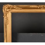 20th Century English School. A Gilt Composition Frame, with swept centres and corners, rebate 23" x