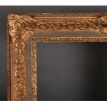 Early 20th Century French School. A Louis Style Gilt Composition Frame, with swept centres and corne