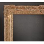 20th Century English School. A Painted Composition Frame, with swept centres and corners, rebate 30"