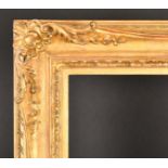 20th Century French School. A Louis XV Style Carved Giltwood Frame, rebate 29.5" x 16.5" (74.9 x 41.