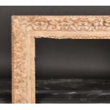 18th Century French School. A Louis XV Carved Giltwood Frame, with swept centres and corners, (parti