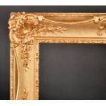 19th Century English School. A Painted Composition Frame, with swept centres and corners, rebate 26"