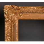 20th Century European School. A Gilt Composition Frame, with swept centres and corners, rebate 42" x