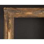 20th Century English School. A Gilt Composition Frame, with swept centres and corners, rebate 36"