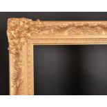 20th Century English School. A Gilt Composition Frame with swept corners, rebate 30" x 20" (76.2 x