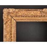 17th Century French School. A Fine Louis XIV Carved Giltwood Frame, with swept centres and