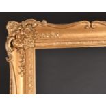 20th Century English School. A Gilt Composition Frame, with swept and pierced centres and corners,