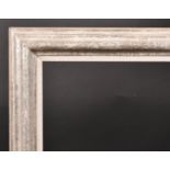 20th Century English School. A Silvered Composition Frame, with a white slip, rebate 29.75" x 24.75"