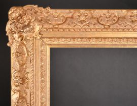 20th Century English School. A Gilt Composition Frame, with swept centres and corners, rebate 56"