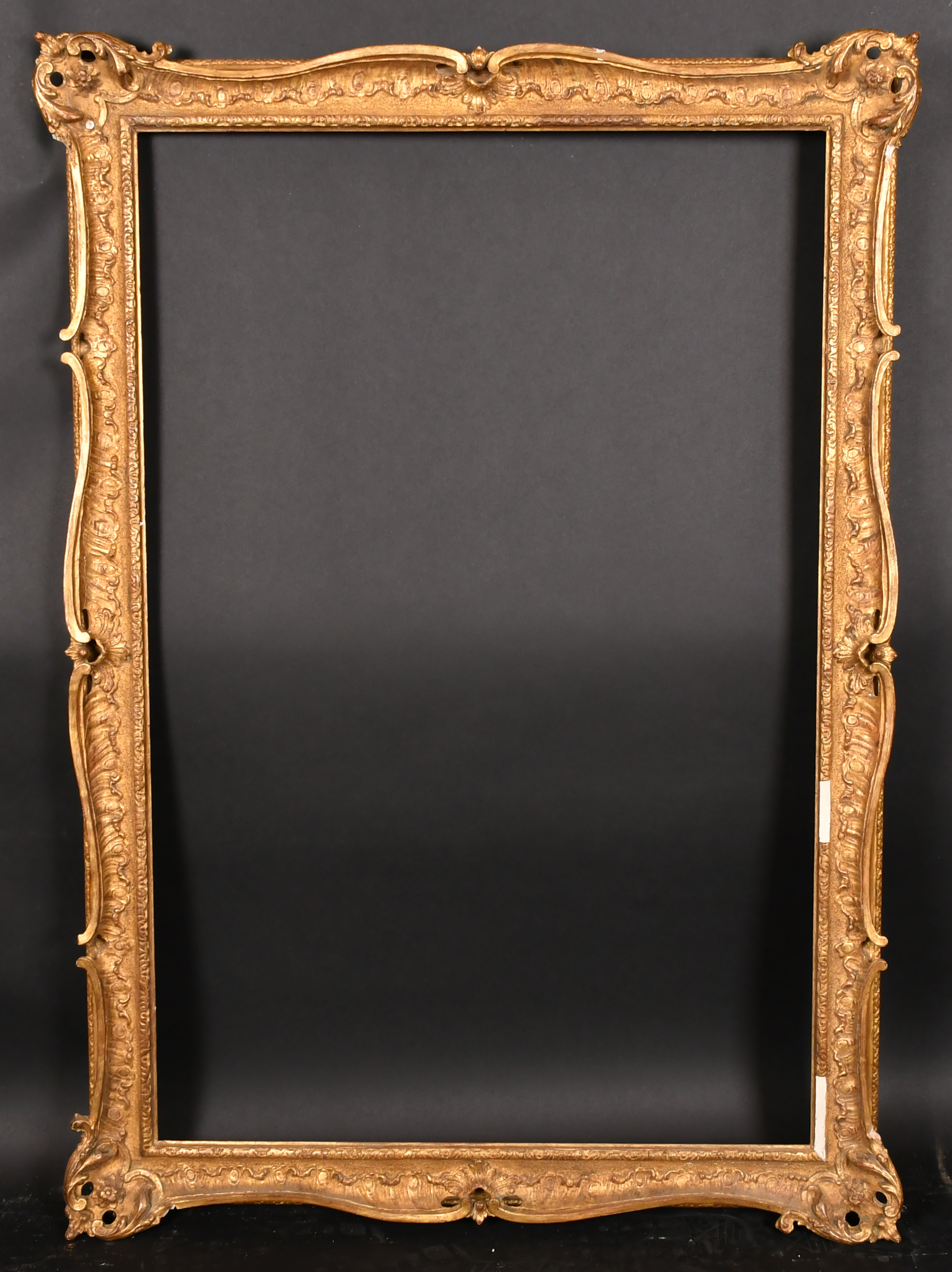 20th Century English School. A Gilt Composition Frame, with swept and pierced centres and corners, - Image 2 of 3