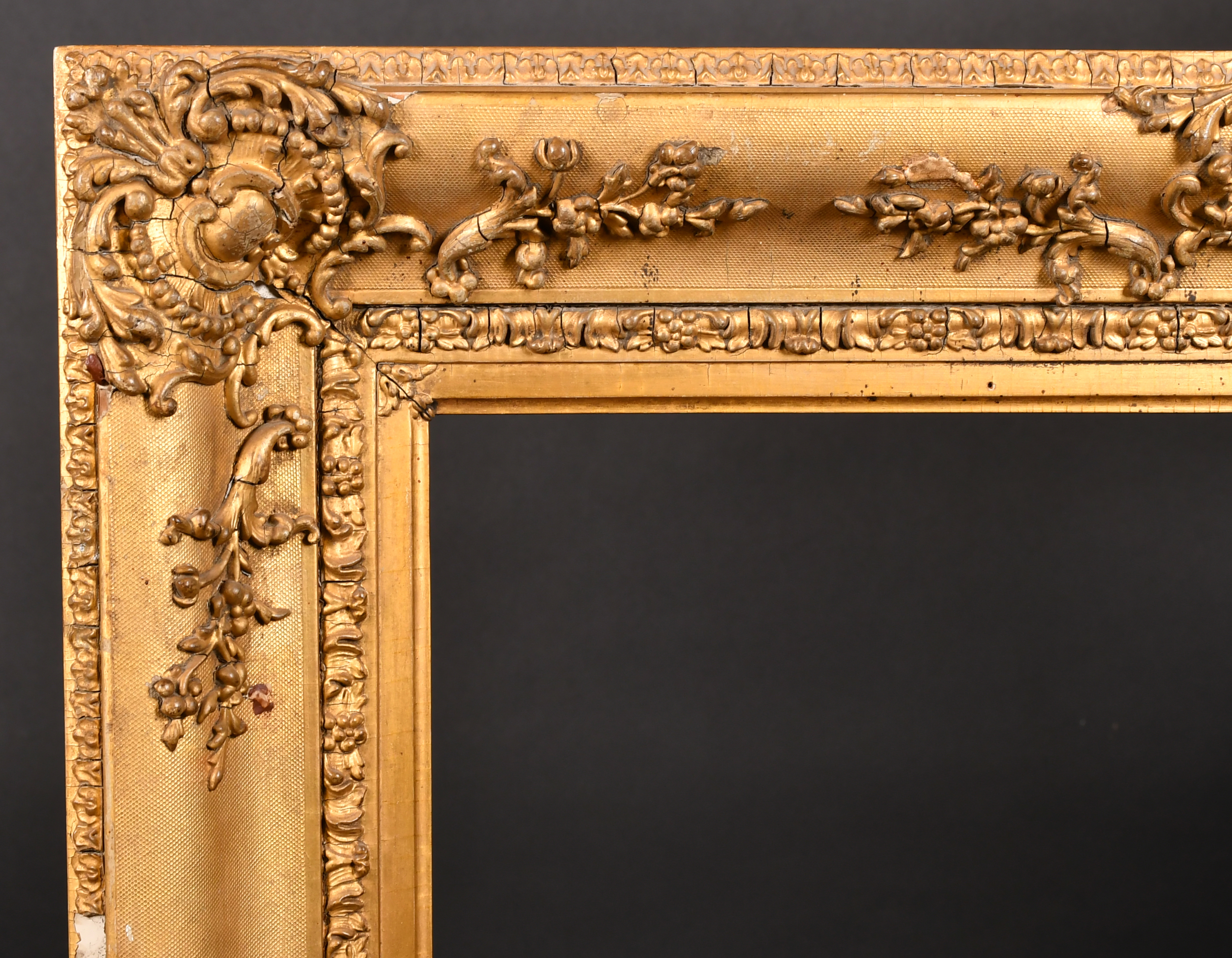 19th Century English School. A Gilt Composition Frame, with swept centres and corners, rebate 30"