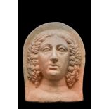 ETRUSCAN TERRACOTTA VOTIVE HEAD OF A WOMAN