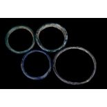 COLLECTION OF FOUR ROMAN GLASS BRACELETS