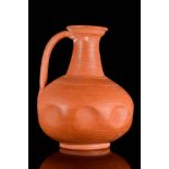 A ROMAN NORTH AFRICAN TERRA SIGILLATA POTTERY JUG