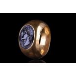 LARGE HELLENISTIC GOLD RING WITH ONYX INTAGLIO PORTRAIT