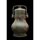 CHINESE BRONZE RITUAL WINE VESSEL AND COVER (YOU)