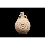 ANCIENT EGYPTIAN FAIENCE NEW YEAR'S FLASK WITH ROSETTES