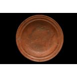 ROMAN TERRA SIGILLATA DISH WITH A STAR