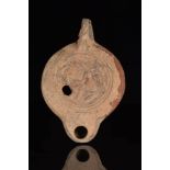 ROMAN TERRACOTTA OIL LAMP WITH EROS AND A CRANE - TL TESTED