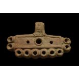 ROMAN TERRACOTTA TEN-SNOUTED OIL LAMP