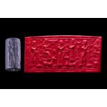 EARLY NEO-BABYLONIAN BLACK STONE CYLINDER SEAL