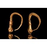 GREEK HELLENISTIC GOLD TWISTED EARRINGS WITH LION HEADS