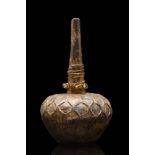 EARLY ISLAMIC GLASS FLASK WITH DECORATION