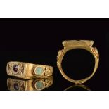 MAMLUK GOLD RING WITH GARNET AND ENAMEL