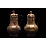 SELJUK PAIR OF COPPER JUGS WITH SILVER INLAID