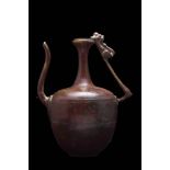 RARE SELJUK COPPER EWER WITH LION THUMB SUPPORT