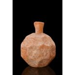 EARLY ISLAMIC WHEEL-CUT GLASS FLASK WITH ELEGANT HONEYCOMB PATTERN