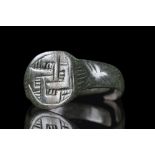 VIKING AGE BRONZE RING WITH SWASTIKA