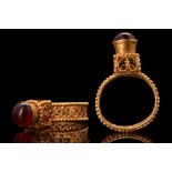 BYZANTINE ARCHITECTURAL GOLD RING WITH GARNET