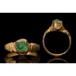 LATE MEDIEVAL GILT BRONZE RING WITH GEM
